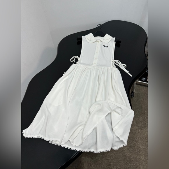Meet the Posher Dresses & Skirts - Miu Miu white baby doll dress